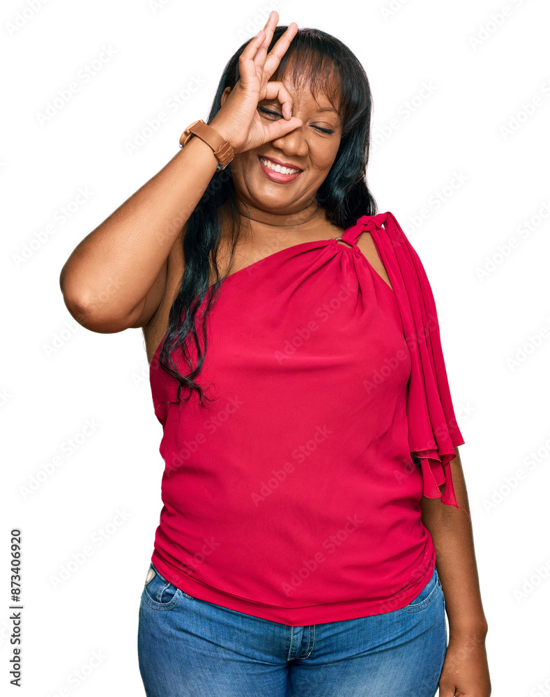 Hispanic middle age woman wearing casual clothes smiling happy doing ok sign with hand on eye looking through fingers Hispanic middle age woman wearing casual clothes smiling happy doing ok sign with hand on eye looking through fingers