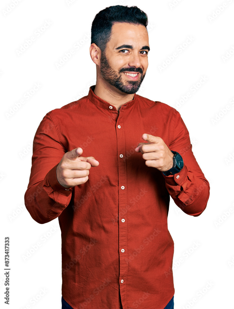 Φωτογραφία Young hispanic man with beard wearing casual shirt pointing fingers to camera with happy and funny face