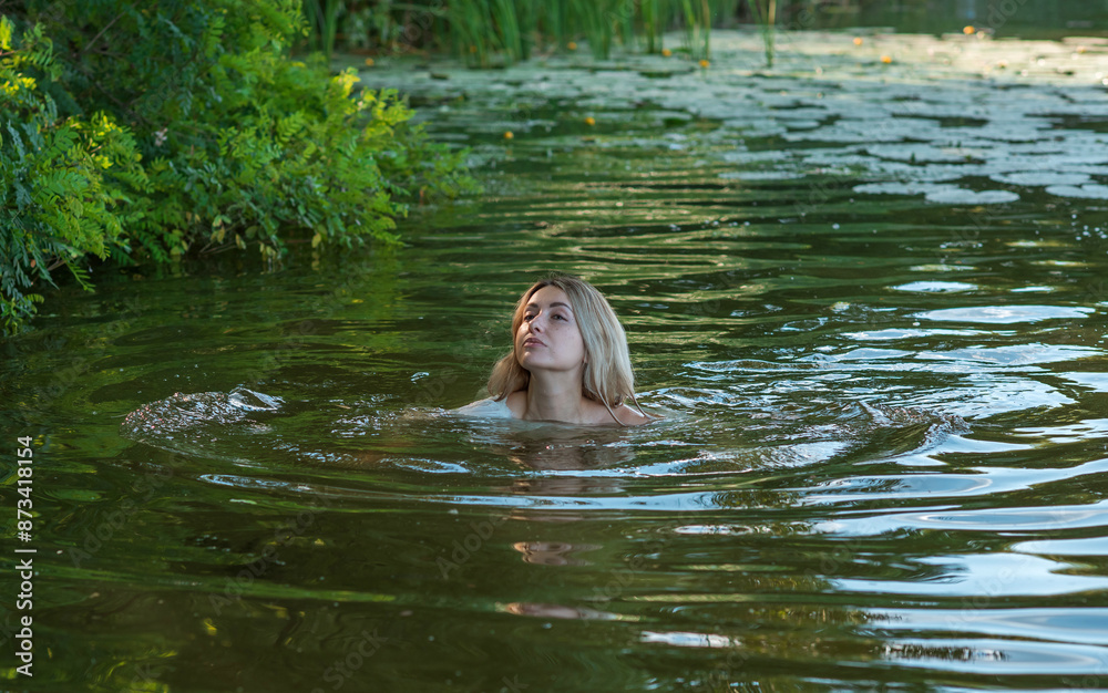 Fototapeta premium Natural appearance lady in the lake. Femininity concept, naturally skin
