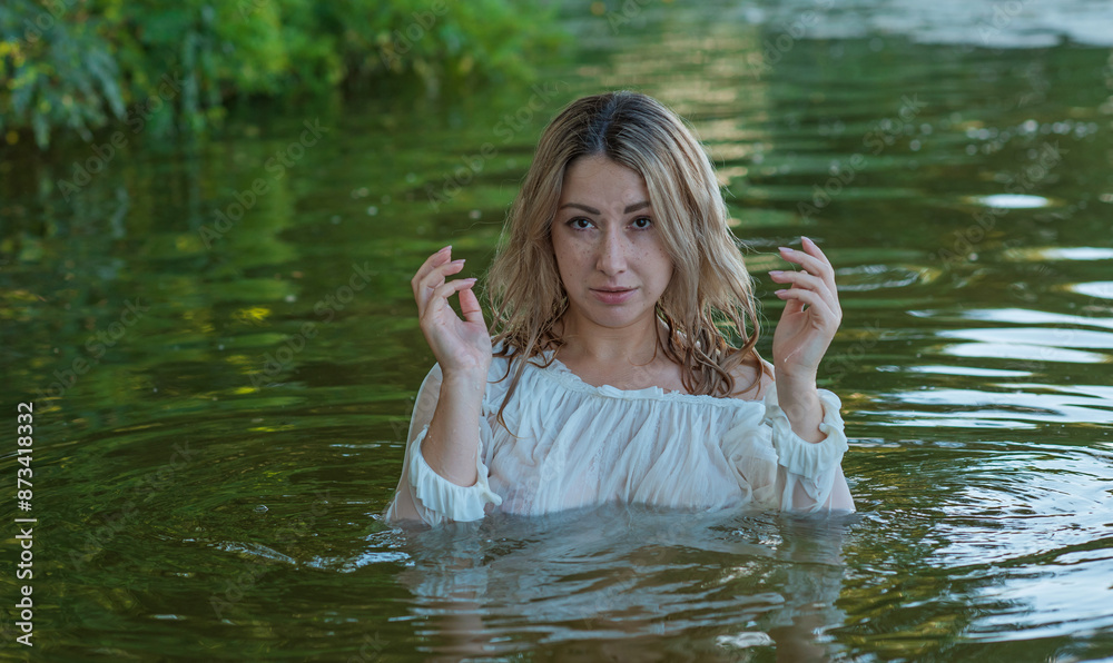 Fototapeta premium Natural appearance lady in the lake. Femininity concept, naturally skin