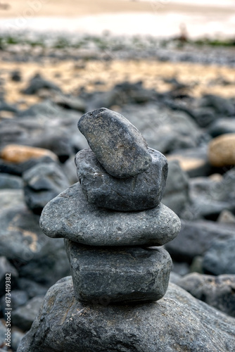 A stack of zen-like balancing stones on a beach in St Ives, Cornwall