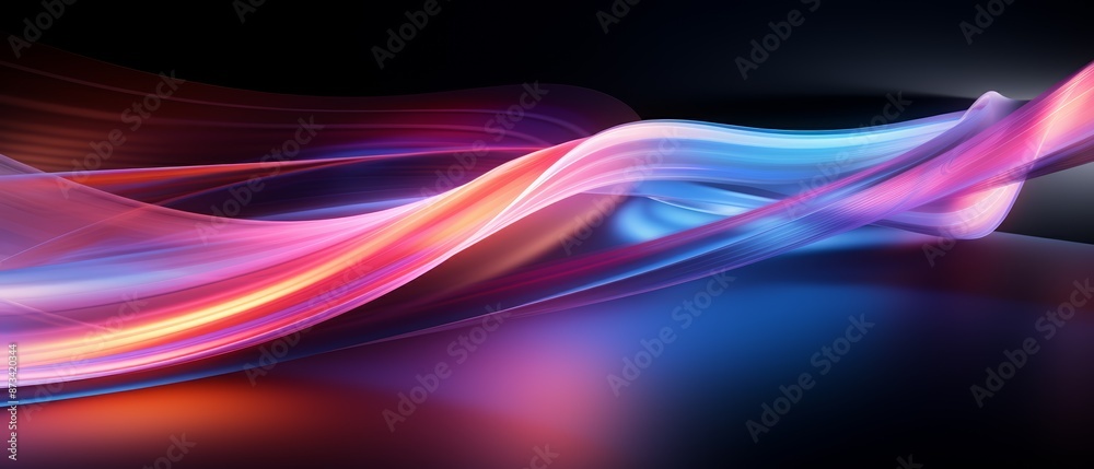 Obraz premium Abstract light trails in flowing motion, featuring vibrant hues of red, blue, and purple against a dark background, creating a dynamic and fluid visual effect.