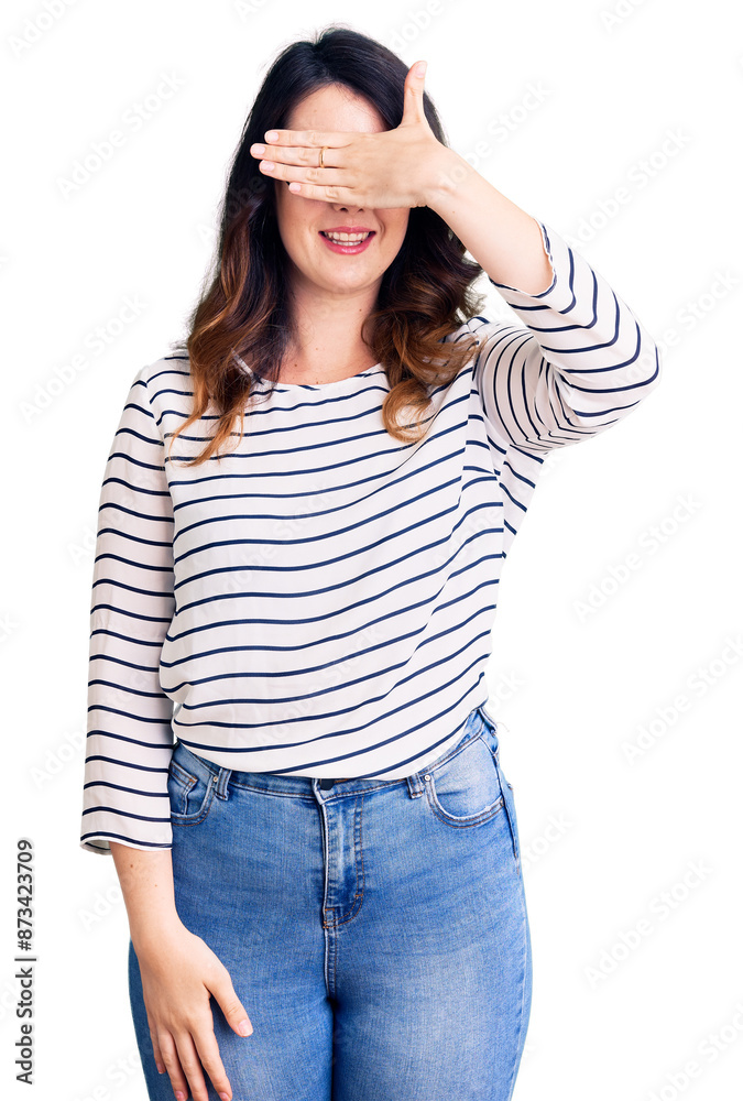 Beautiful young brunette woman wearing casual clothes and glasses smiling and laughing with hand on face covering eyes for surprise. blind concept. Beautiful young brunette woman wearing casual clothes and glasses smiling and laughing with hand on face covering eyes for surprise. blind concept.