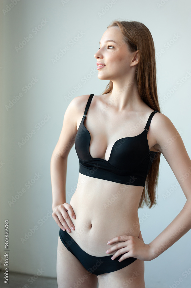 Fototapeta premium Perfect woman posing in lingerie in studio. Model test snapshot