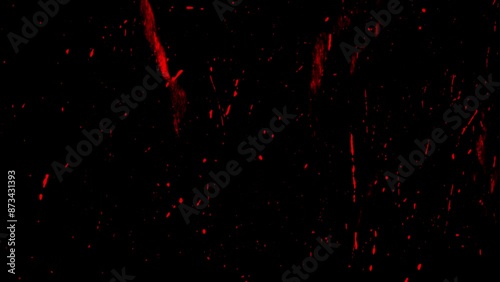 stop motion of red dot and splatters on black background