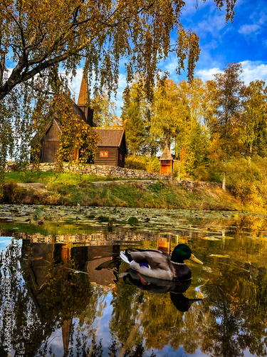 Autumn in Lillehammer: Explore the vibrant fall foliage and historic charm of Maihaugen. Experience Norway's cultural heritage amidst stunning autumn landscapes. photo