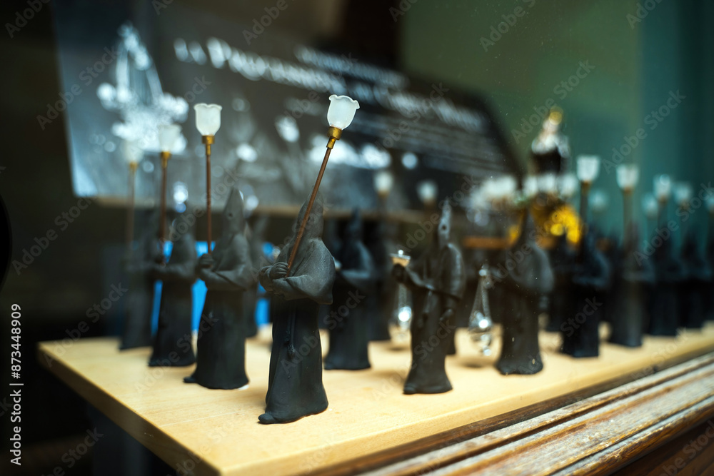 Decorative item of a religious people walking with a light, group of cult statue miniature