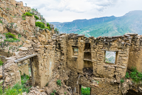 Ruins of the Caucasian mountain village of Gamsutl in Dagestan, Russia photo