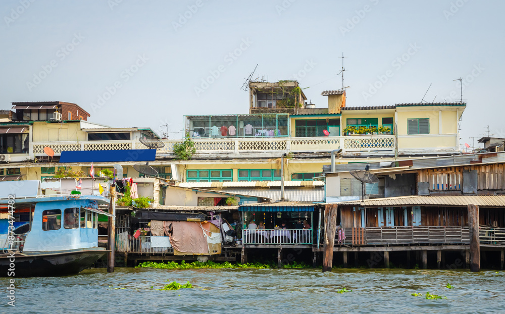Traditional Thai houses on the water in Bangkok, Thailand