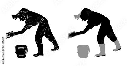 Male car wash worker with a washcloth in his hand cleans, black silhouette
