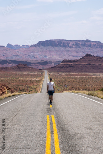 Walking on a Desert Road near Hite Crossing Bridge photo