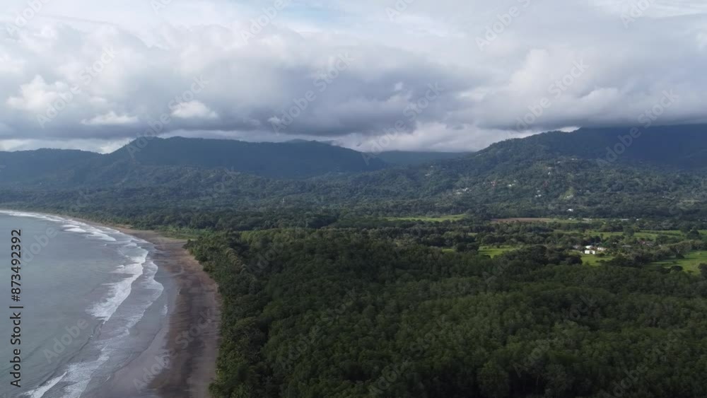 Panorama of forest, mountains, beach and sea. Aerial footage, drone footage view from the top, beautiful ocean Panorama of forest, mountains, beach and sea. Aerial footage, drone footage view from the top, beautiful ocean