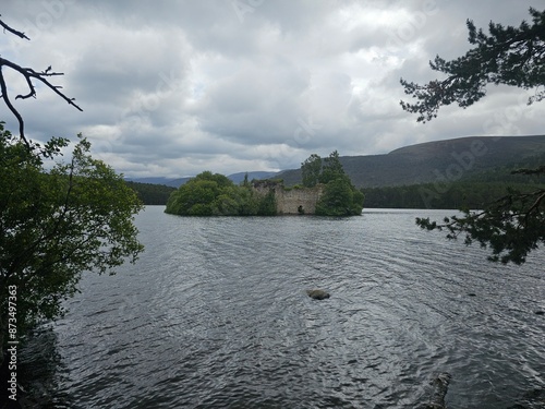 Loch an Eilein (loch of the island) with its island castle ruin and stunning surroundings of forest and hill, has seen human use for many centuries. photo