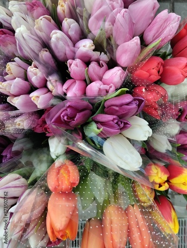 Floral background tulip flowers in a bouquet of verny angle. Flower Background Concept photo