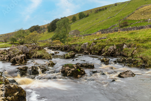 Europe, United Kingdom, England, Yorkshire, Yorkshire Dales. Buckden, Skipton, Nature walks through Yorkshire National park. The River Wharfe. Digital composite sky. photo