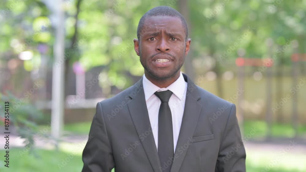 Portrait of African Businessman in Argument Outdoor Portrait of African Businessman in Argument Outdoor