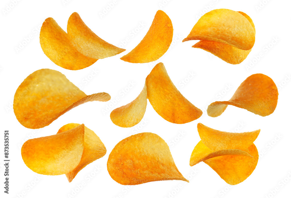 Set potato chips with red paprika flying, isolated on white, clipping path Set potato chips with red paprika flying, isolated on white, clipping path