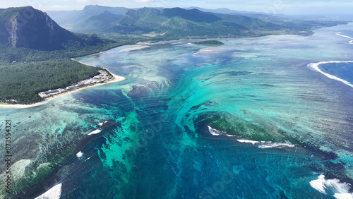 Underwater Waterfall At Le Morne Beach In Mauritius Island Mauritius. Indian Ocean Beach. Africa Background. Le Morne Beach At Mauritius Island Mauritius. Tourism Landscape. Nature Seascape. © bydronevideos