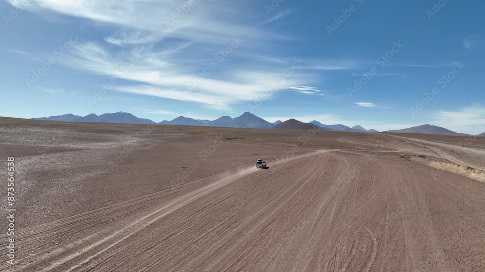 Atacama Desert, Chile. Car on the road. Aerial view by drone. Atacama Desert, Chile. Car on the road. Aerial view by drone.
