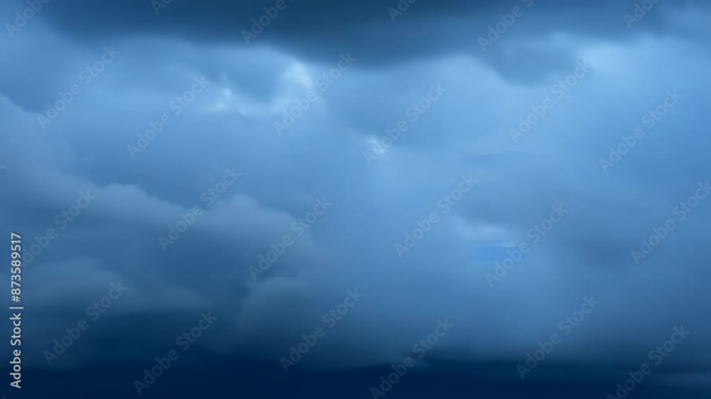 Brooding storm clouds loom over a vast, dark body of water. Intense blue hues dominate, creating an eerie, foreboding atmosphere. Layered clouds hint at impending turbulence. Brooding storm clouds loom over a vast, dark body of water. Intense blue hues dominate, creating an eerie, foreboding atmosphere. Layered clouds hint at impending turbulence.