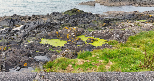 Aerial photo of Beautiful Scenery of Rocks Mountains and Sea in the North Coast Northern Ireland photo