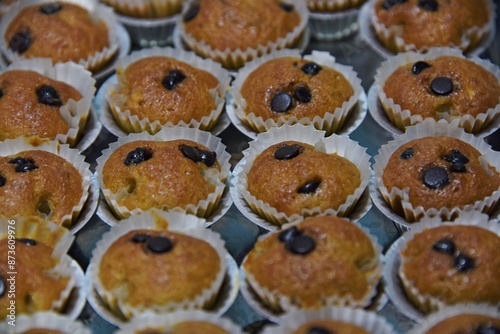 mini banana cupcakes are brown color baking in the oven