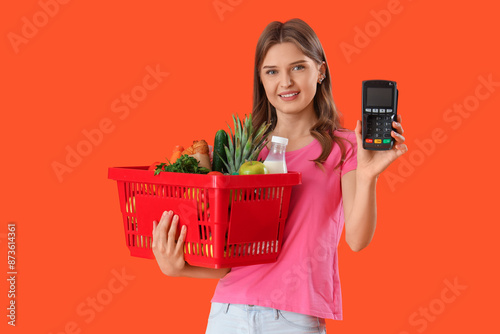 Young woman with full shopp...