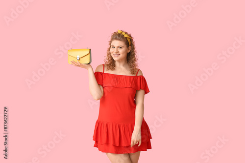 Beautiful young woman in st...