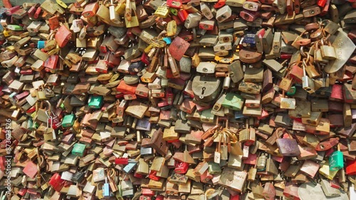 The bridge railings are densely hung with love locks. Millions of love locks hang on the Hohenzollern Bridge symbolize love