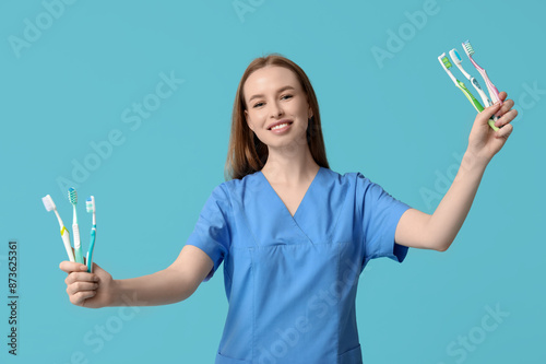 Female dentist with plastic...