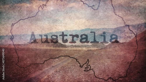 A car drives across the Australian outback