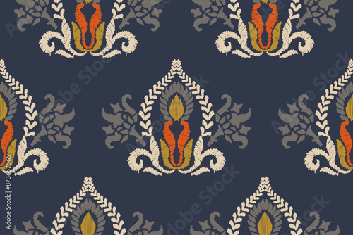 Ikat floral paisley embroidery on blue background. Traditional ethnic ikat, aztec abstract vector pattern, seamless pattern in tribal, folk embroidery and mexican style.
