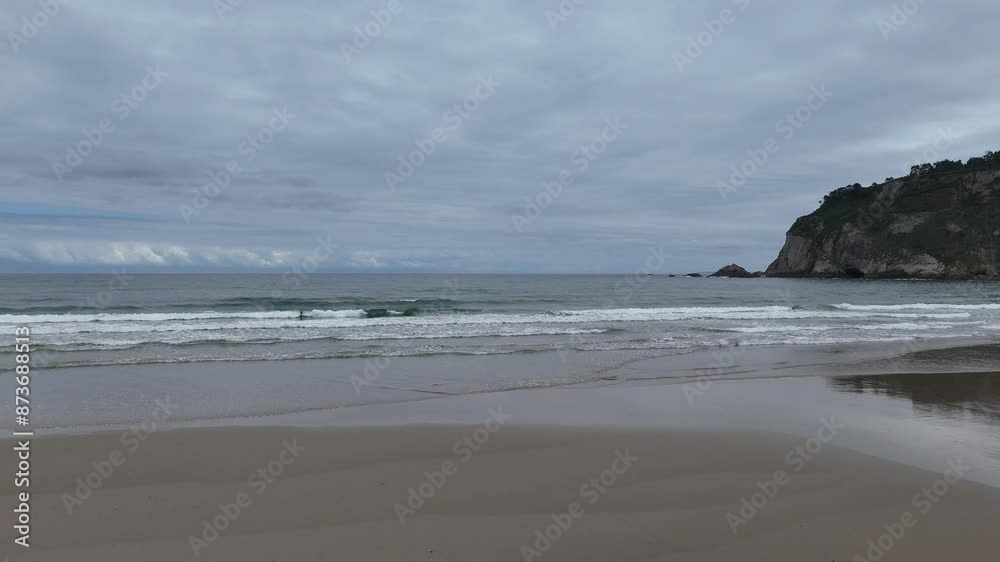 Waves breaking on beach Asturias coast line Spain drone,aerial Waves breaking on beach Asturias coast line Spain drone,aerial