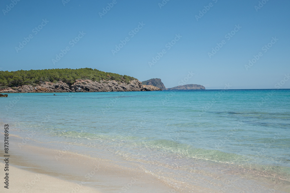 Crystal clear turquoise waters of the beaches of Ibiza in summer Crystal clear turquoise waters of the beaches of Ibiza in summer