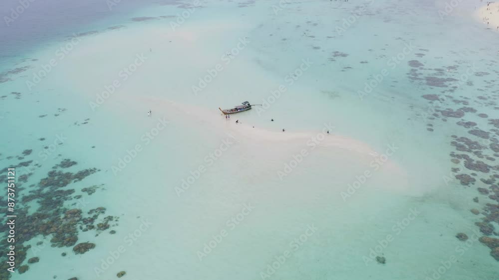 Aerial view of clear blue turquoise seawater, Andaman sea in Phuket island in summer season, Thailand. Water in ocean pattern texture wallpaper background.
