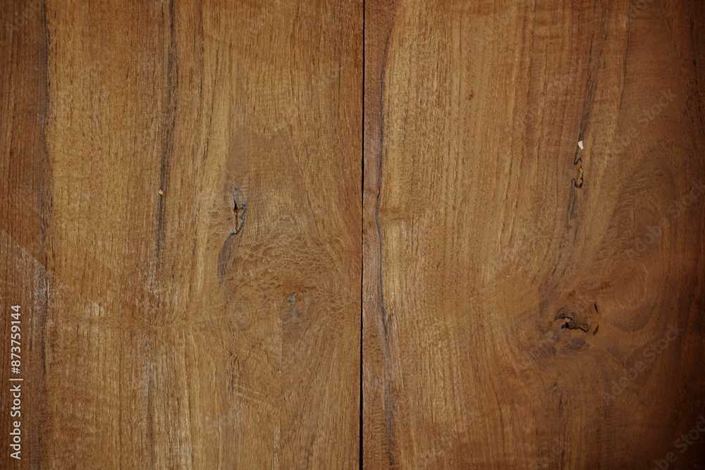 Naklejka premium Dark brown wooden panels texture abstract background