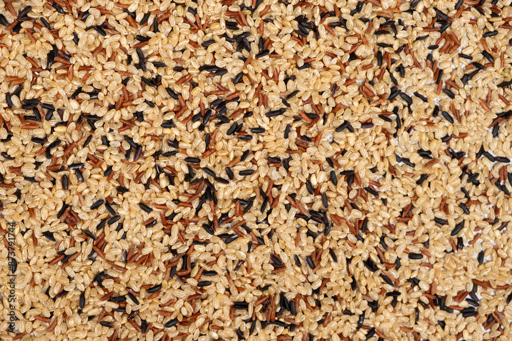 Mix of white, red and black rice, top view, close up Mix of white, red and black rice, top view, close up