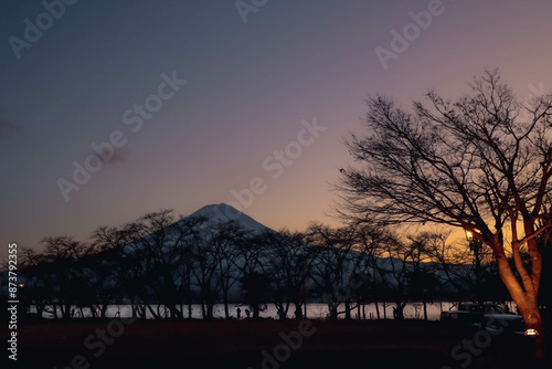 view of lake and mountain in evening