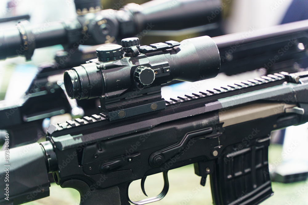 Modern weapons automatic rifles and machine gun on the counter. Firearms for the army and police