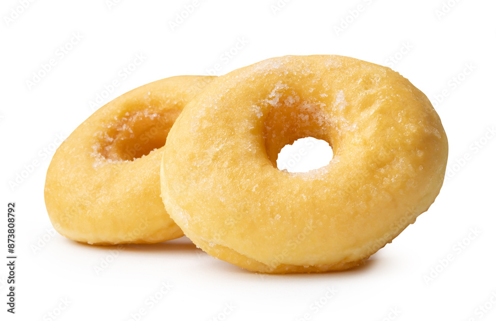 Front view of brown sugar glazed cinnamon donuts in stack isolated on white background with clipping path Front view of brown sugar glazed cinnamon donuts in stack isolated on white background with clipping path