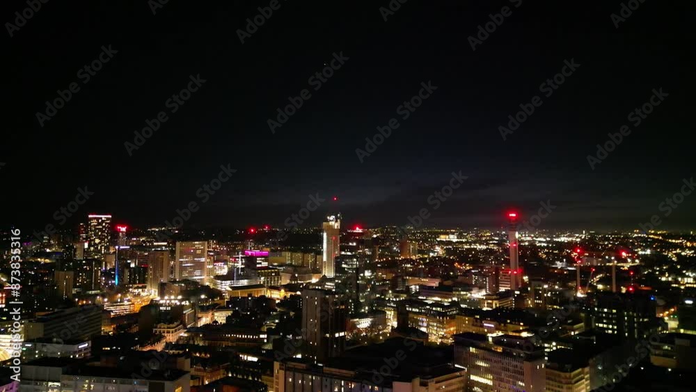 An Aerial View of Illuminated Tall Buildings During Night at Central Birmingham City of England Great Britain. March 30th, 2024 An Aerial View of Illuminated Tall Buildings During Night at Central Birmingham City of England Great Britain. March 30th, 2024