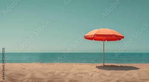 Orange Beach Umbrella on Sandy Shore Under Summer Sky