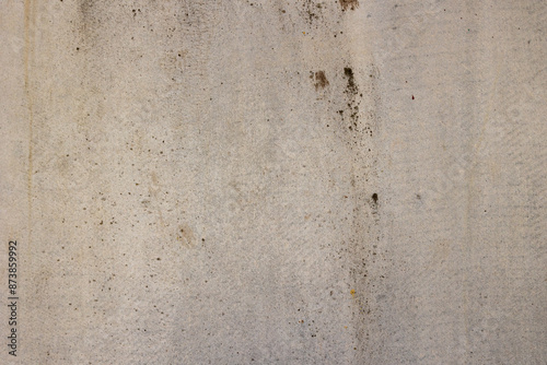 Texture of an old concrete wall with traces of dirt