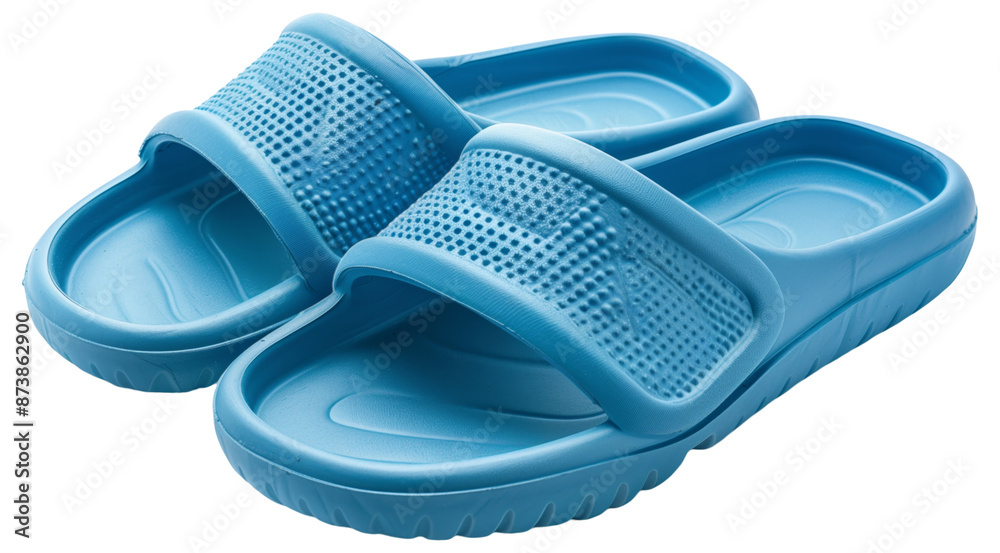 A pair of blue rubber slides featuring textured straps and comfortable footbeds. Perfect for casual wear and beach outings. A pair of blue rubber slides featuring textured straps and comfortable footbeds. Perfect for casual wear and beach outings.