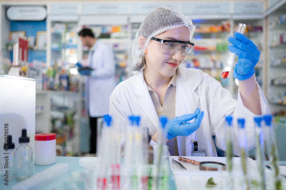 Chemical scientist doing antibiotic trials and testing in the laboratory Chemical scientist doing antibiotic trials and testing in the laboratory