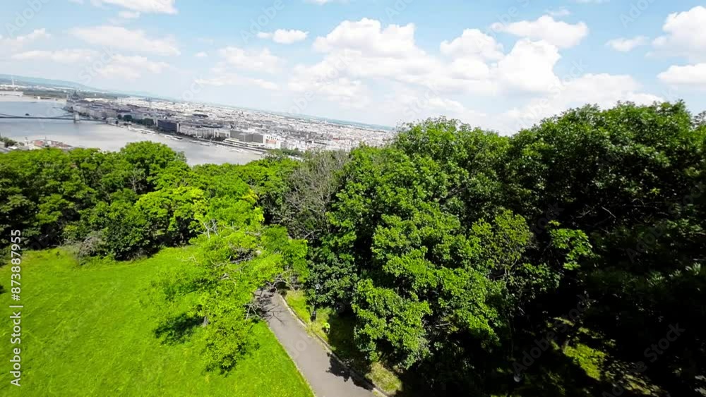 This stunning 4K aerial cityscape of Budapest, Hungary , showcases the citys iconic landmarks, including the Danube River, the Buda Castle, and the Hungarian Parliament Building. Filmed from a birds This stunning 4K aerial cityscape of Budapest, Hungary , showcases the citys iconic landmarks, including the Danube River, the Buda Castle, and the Hungarian Parliament Building. Filmed from a birds