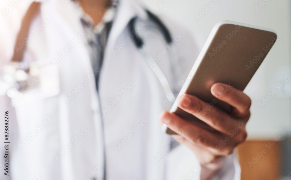 Healthcare, doctor and hand with phone in hospital for medicine research, information and communication. Oncology, professional and person with tech for telehealth, network and online medical news Healthcare, doctor and hand with phone in hospital for medicine research, information and communication. Oncology, professional and person with tech for telehealth, network and online medical news