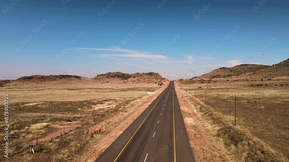 Deserted winter road in South Africa: endless horizon, complete isolation, tranquil scene, and untouched natural beauty Deserted winter road in South Africa: endless horizon, complete isolation, tranquil scene, and untouched natural beauty