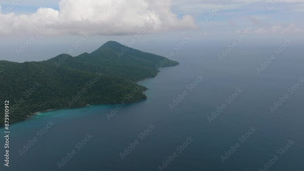 The coast of the island of Weh with bays and lagoons view from above. Tropical landscape. Aceh, Indonesia. The coast of the island of Weh with bays and lagoons view from above. Tropical landscape. Aceh, Indonesia.