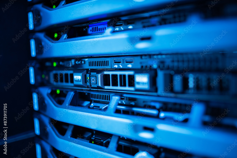 close up of network cables connected to server racks in data center room. close up of network cables connected to server racks in data center room.